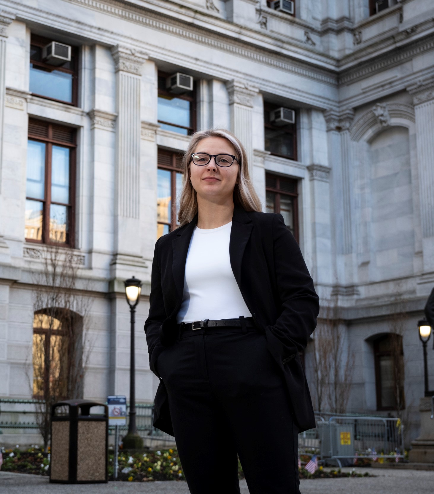 Anna Breece poses for a photo outside of city hall.