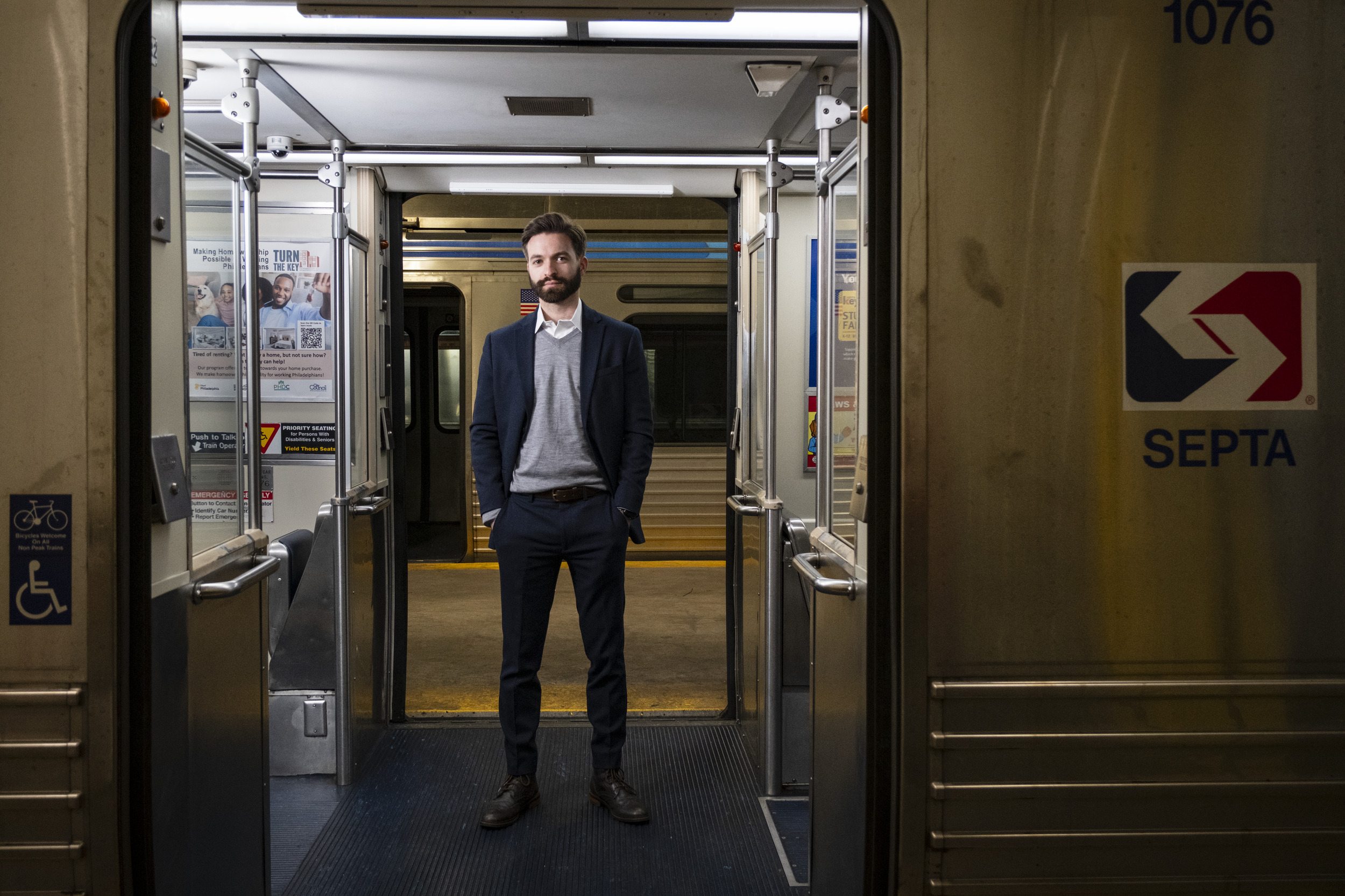 Benjamin Aitoumeziane poses in a SEPTA subway car.