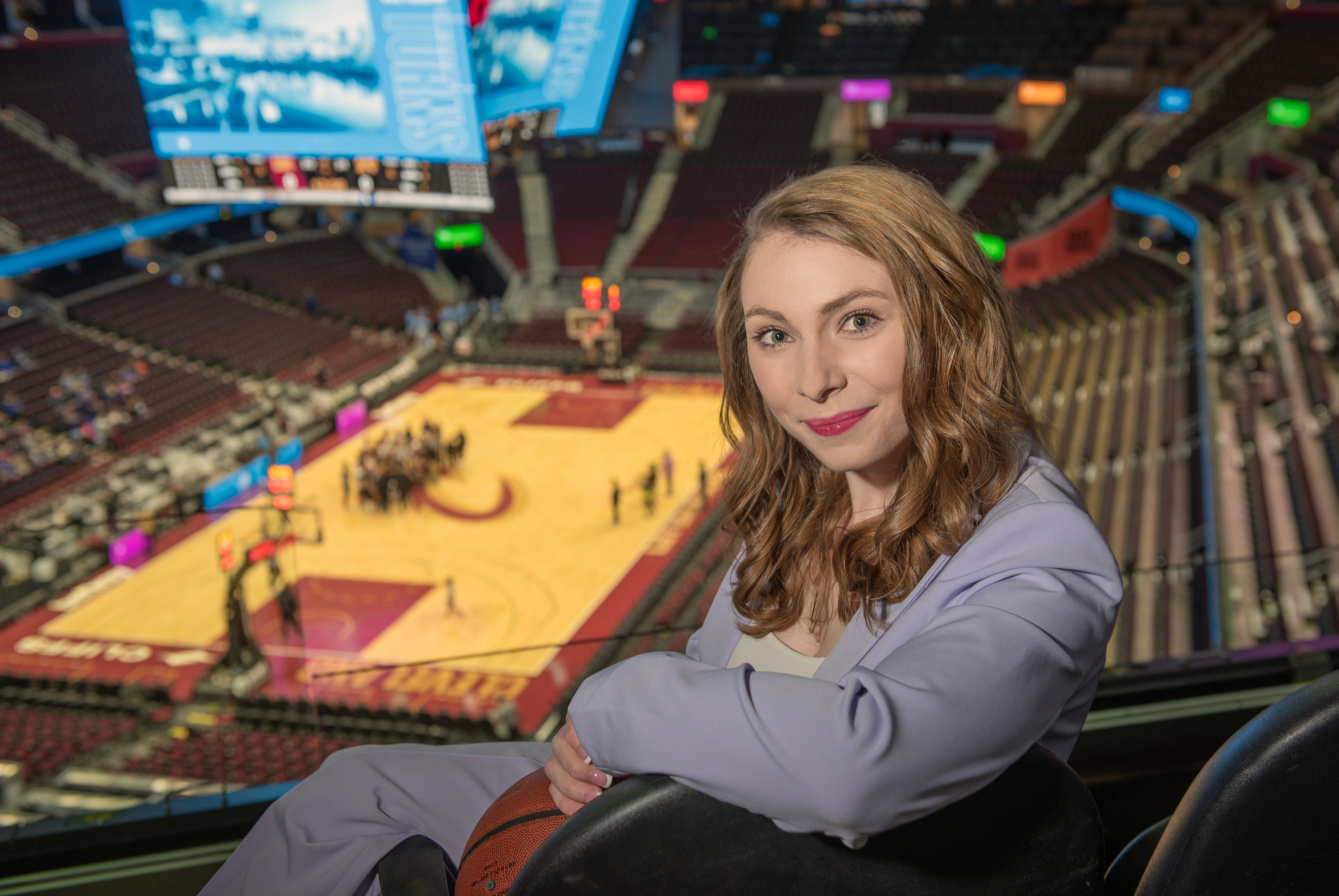 Mary Kate Meals sitting in an arena.