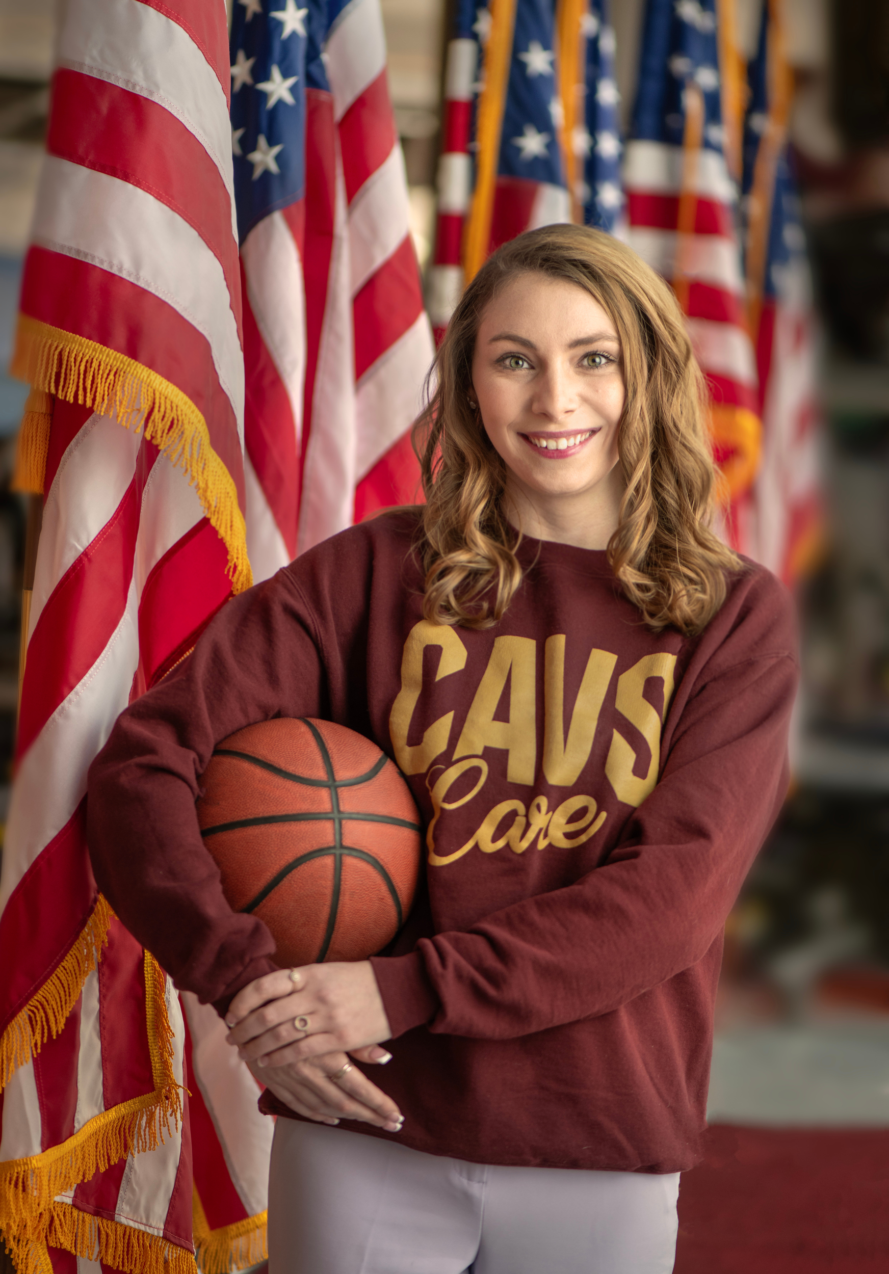 Mary Kate Meals holding a basketball.