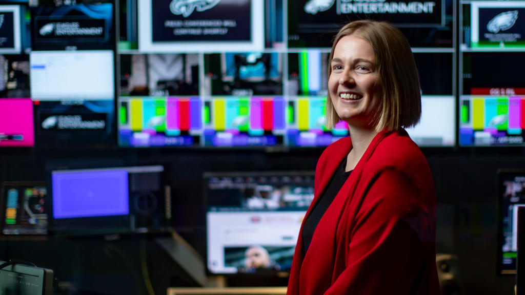Brynna Haupt poses for a photo in the Philadelphia Eagles production studio.