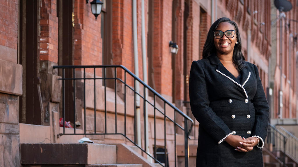 Simone Snead poses for a photo in the streets of Philadelphia.
