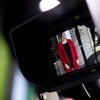Brynna Haupt in the viewscreen of a camera.