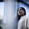 Anisa Ara looking into the distance.