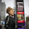 Melissa Rakiro smiles in Times Square.