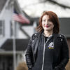 Andrea Miller poses for a photo outside.