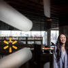Nhi Nguyen posing for a photo at her Walmart corporate office.