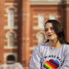 Honoree Rachel Greenberg wearing a grey t shirt with a rainbow heart on the front