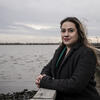 Honoree Brittney Martinez standing outside and smiling. The Delaware River can be seen in the background.