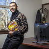 Tarik Richardson poses for a photo in his office.