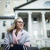 Honoree Faith Scanlon standing outside and wearing a pink scarf