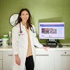 30 under 30 honoree Ivana Theresa Kohut wearing a white lab coat and smiling