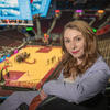 Mary Kate Meals sitting in an arena.