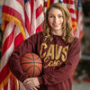 Mary Kate Meals holding a basketball.
