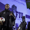 Najeeb Emmanuel poses with a ball.